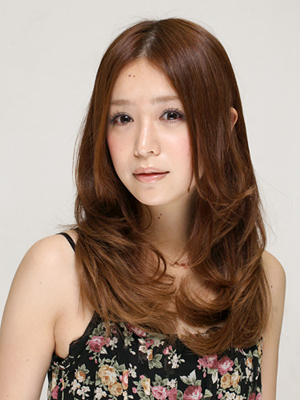 ทรงผมแสกกลางดัดลอน