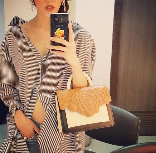 เสื้อเชิ้ตเปิดไหล่