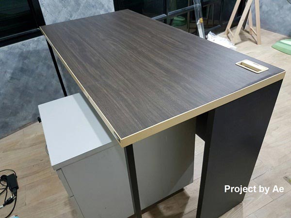 วิธีแก้ไขโต๊ะไม้อัดพองตัว