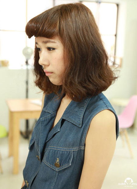 ผมหน้าม้าม้วน