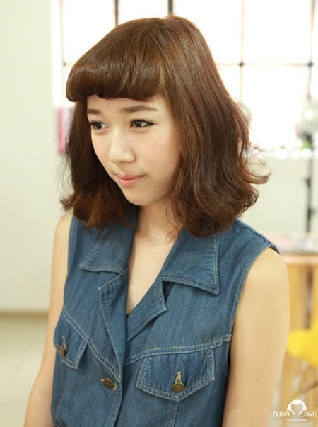 ผมหน้าม้าม้วน