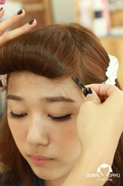ผมหน้าม้าม้วน