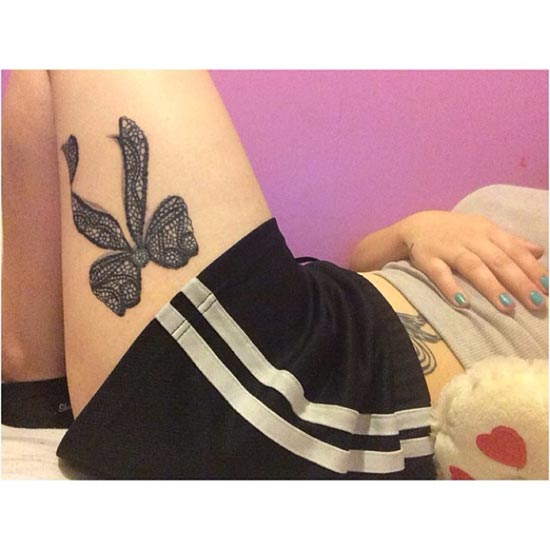 รอยสักต้นขาผู้หญิง 